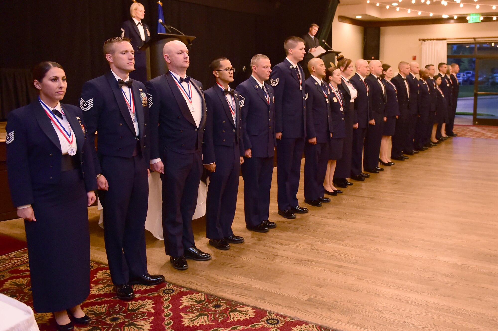 Twenty members of Team Buckley were recognized for making it to the Senior NCO ranks Aug. 29, 2015, at Heritage Eagle Bend Golf and Country Club, Colo. Chief Master Sgt. Brian McMahon, Air Force Space Command command chief, was the guest speaker at the ceremony and offered words of wisdom to the newly inducted Airmen. (U.S. Air Force photo by Airman 1st Class Luke W. Nowakowski/Released)