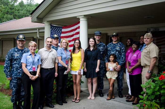 Joint Base Charleston leadership and Balfour Beatty Communities management present military housing resident’s awards, August 27, 2015 at Joint Base Charleston – Weapons Station, S.C. To be eligible for the awards, housing residents completed the annual customer-service feedback forms.  (U.S. Air Force photo/Staff Sgt. AJ Hyatt)