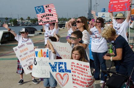 Family members wait for the United States Coast Guard Cutter James to reach its homeport in Charleston, S.C., August 28, 2015. The James is the fifth NSC built out of eight planned for the Legend class cutter fleet. The ship’s namesake, Capt. Joshua James, a native of Hull, Massachusetts, is credited with saving more than 600 lives during his time with the U.S. Life-Saving Service, which merged with the Revenue Cutter Service in 1915 to create the modern U.S. Coast Guard. The James links today’s crew with the renowned lifesavers of the past. (U.S. Air Force photo/Staff Sgt. AJ Hyatt)