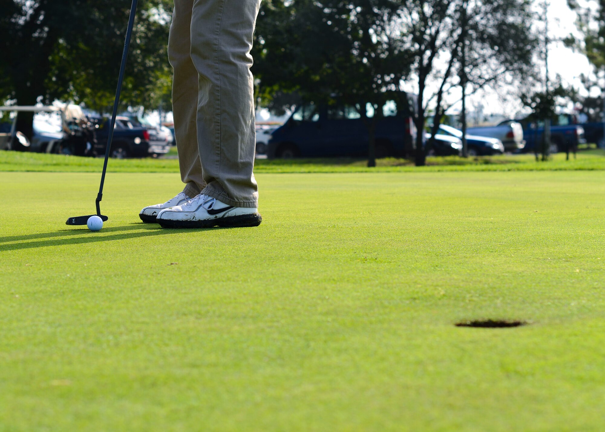U.S. Air Force Senior Airman Josiah Hamernick, 31st Civil Engineer Squadron explosive ordnance disposal journeyman, putts during the annual Adam K. Ginett EOD Warrior Foundation Golf Tournament and Auction, Aug. 28, 2015, at Aviano Air Base, Italy. The more than $12,000 from the tournament, auction and raffles went to the EOD Warrior Foundation. (U.S. Air Force photo by Senior Airman Austin Harvill/Released)