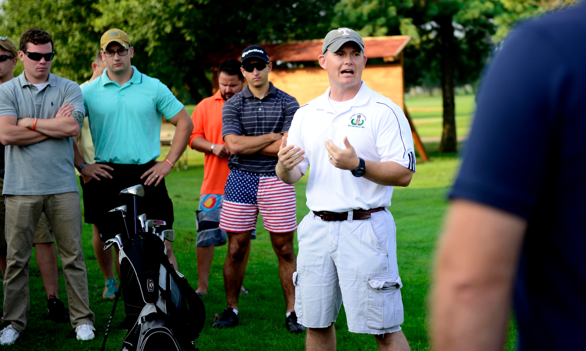 U.S. Air Force Lt. Col. Dennis Phillips, 31st Civil Engineer Squadron commander, gives opening remarks before the annual Adam K. Ginett EOD Warrior Foundation Golf Tournament and Auction, Aug. 28, 2015, at Aviano Air Base, Italy. The more than $12,000 from the tournament, auction and raffles went to the EOD Warrior Foundation. (U.S. Air Force photo by Senior Airman Areca T. Wilson/Released)