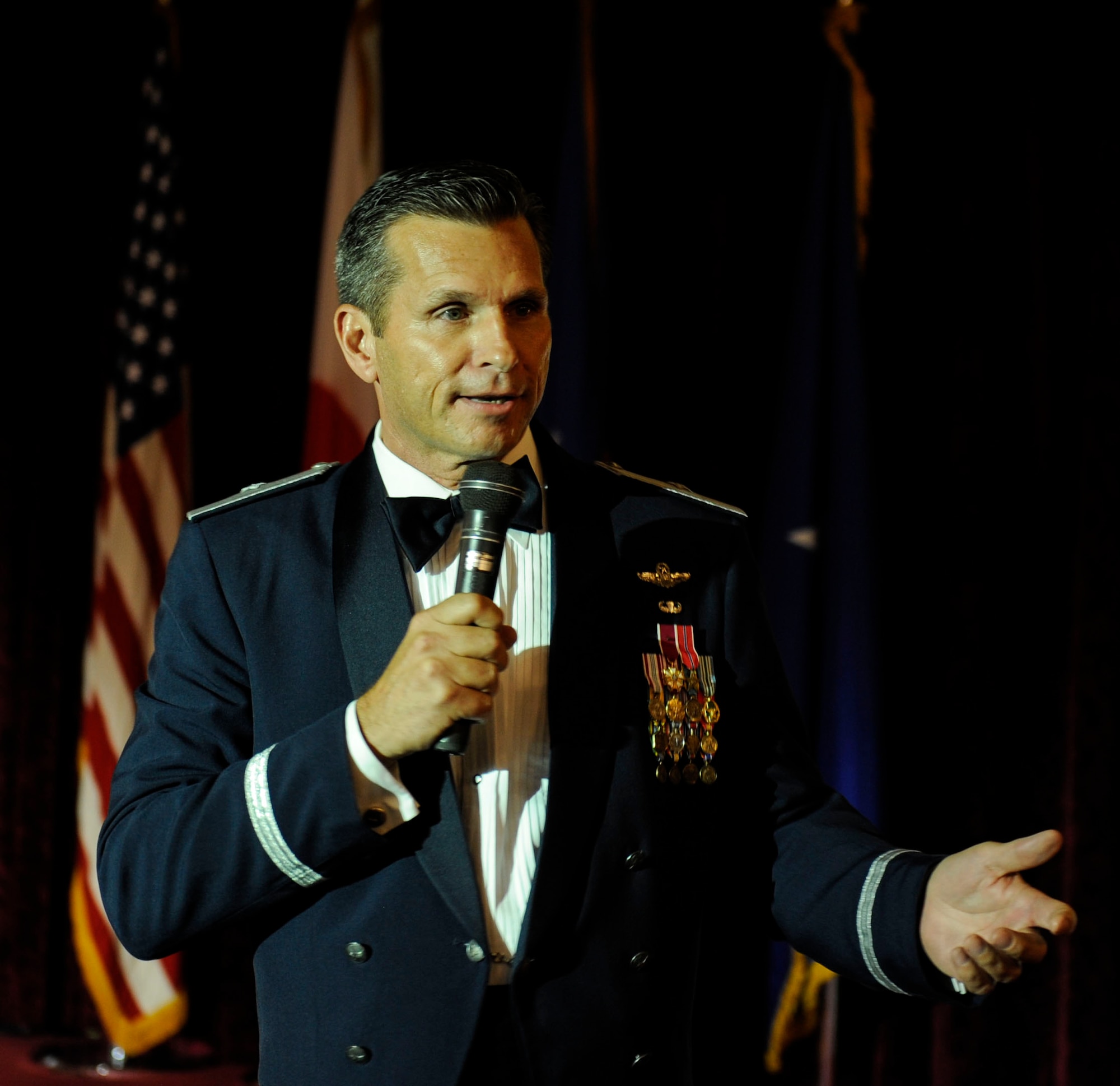 U.S. Air Force Brig. Gen. Barry Cornish, 18th Wing commander, speaks to inductees at the Senior NCO induction ceremony Aug. 28, 2015, on Kadena Air Base, Japan. He congratulated them on their accomplishment and urged them to continue being great leaders. (U.S. Air Force photo by Airman 1st Class Lynette M. Rolen)