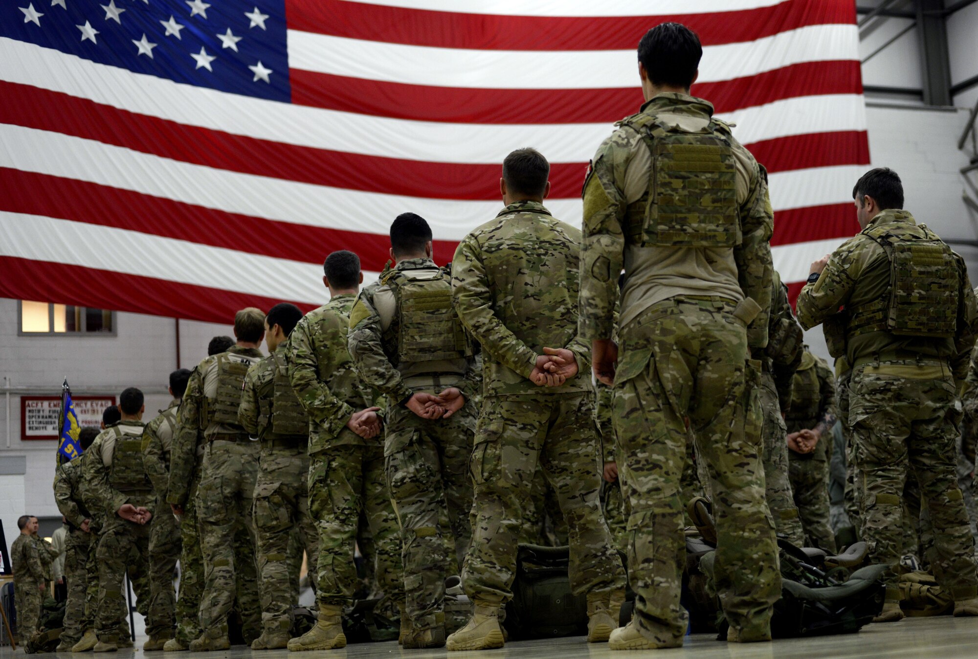 U.S. Air Force Air Commandos await a ruck march in honor of the “Year of the Air Commando” Nov. 30, 2015, on RAF Mildenhall, England. The event began with an opening ceremony to honor those lost in combat since Sept. 11, and then rolled into ruck march around the interior of the airfield. (U.S. Air Force photo by Senior Airman Victoria H. Taylor/Released)