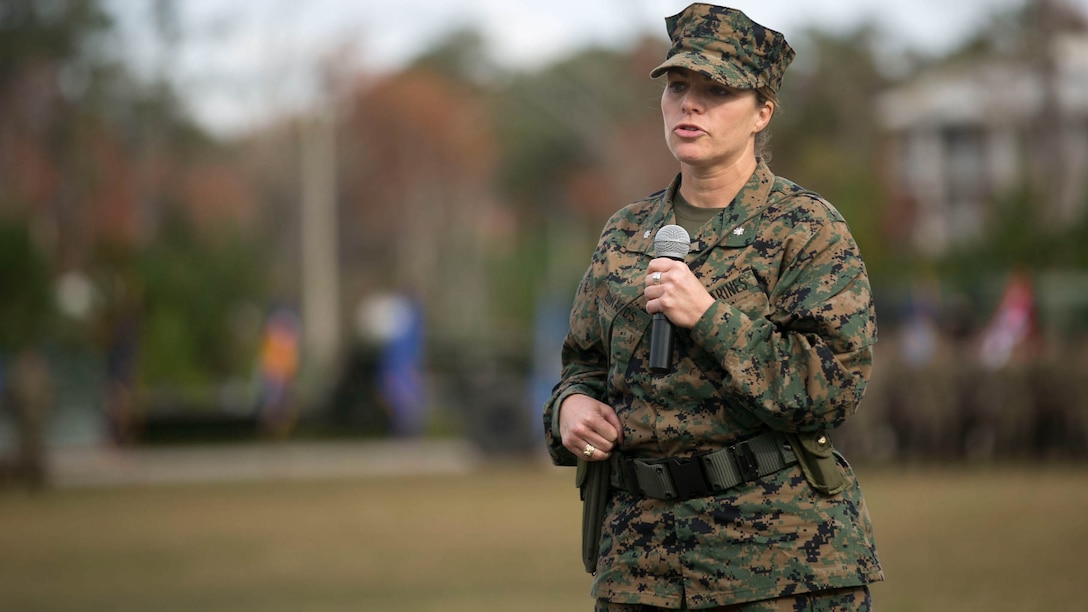 Lt. Col. Lauren Edwards gives a speech during the 8th Engineer Support Battalion change of command ceremony at Camp Lejeune, N.C., Nov. 30, 2015. “I'm extraordinarily proud to take command of 8th ESB today, and I hope that all Marines and Sailors in this battalion recognize that if they work hard and look out for each other they can accomplish whatever they the set their minds to,” said Edwards. Edwards’ new responsibility, as the first female commander of an ESB, will be to provide engineer support to II Marine Expeditionary Forces. 