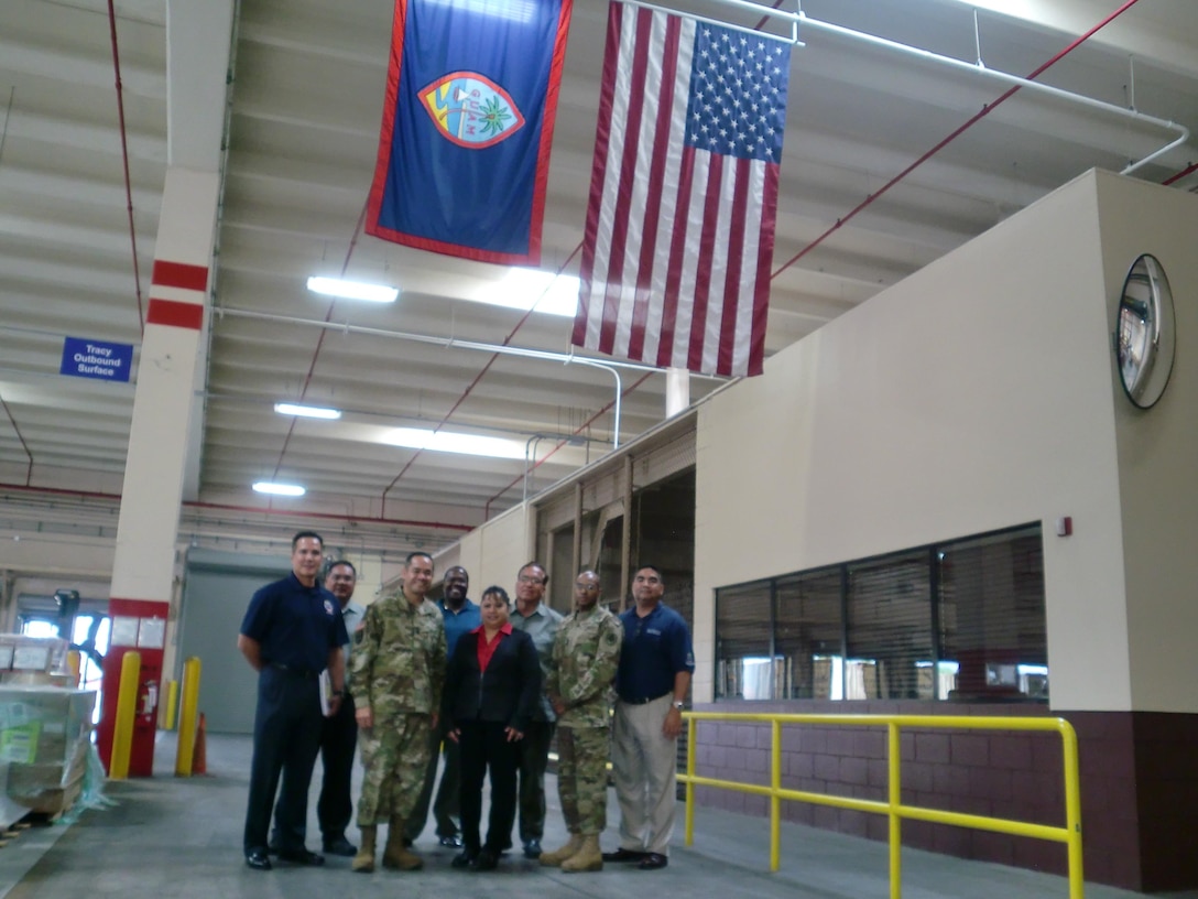 Army Command Sgt. Maj. Charles Tobin, DLA’s senior enlisted advisor, poses with employees at Defense Logistics Agency Distribution Guam, Marianas, during a recent site visit.