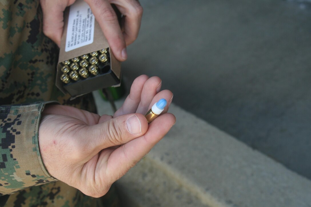 A blue Simunition cartridge to be used during Security Battalion’s active shooter training on Nov. 17. The cartridge will mark its target with blue ink.