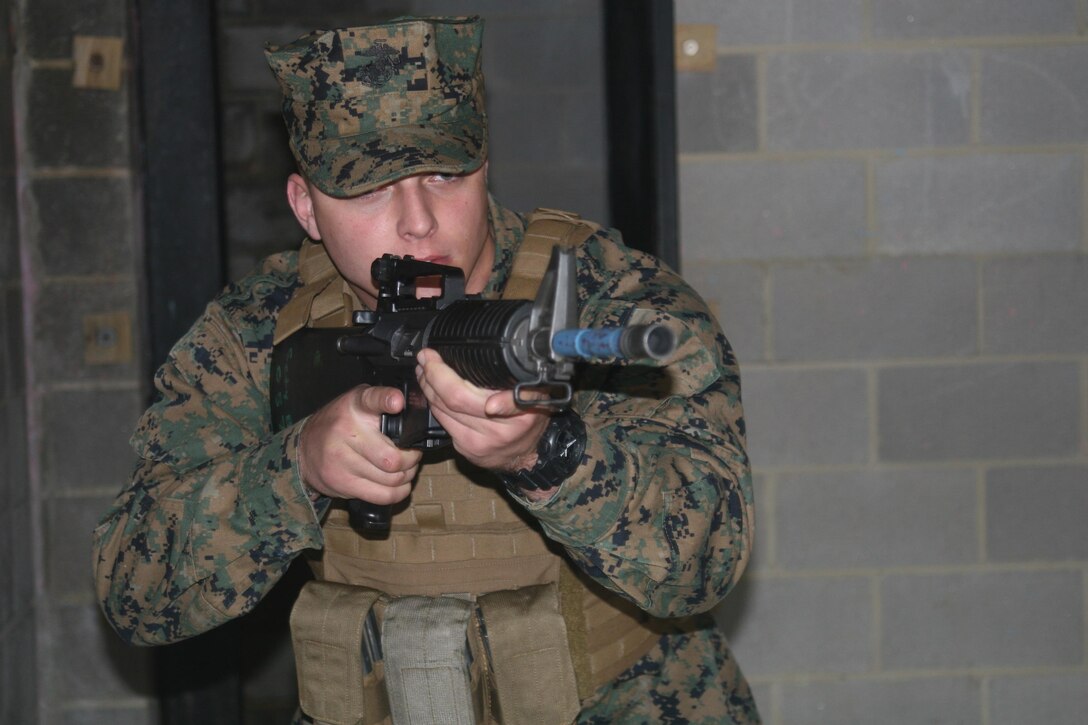 A Marine from Quantico’s Security Augmentation Force practices clearing rooms during active shooter training on Nov. 17.