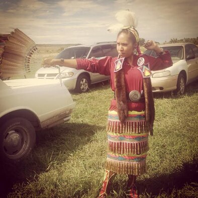 Letyraial Cunningham poses in the traditional Navajo clothing during a Native American social gathering in August at Towaoc, Colo. (Courtesy photo) 