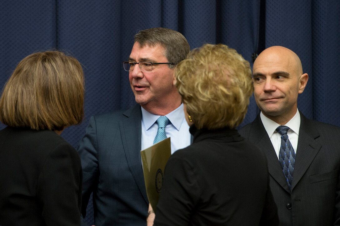 Defense Secretary Ash Carter, center, greets members of the House Armed Services Committee before he testifies about U.S. strategy for Syria and Iraq and its implications for the region in Washington, D.C., Dec. 1, 2015. DoD photo by Air Force Senior Master Sgt. Adrian Cadiz