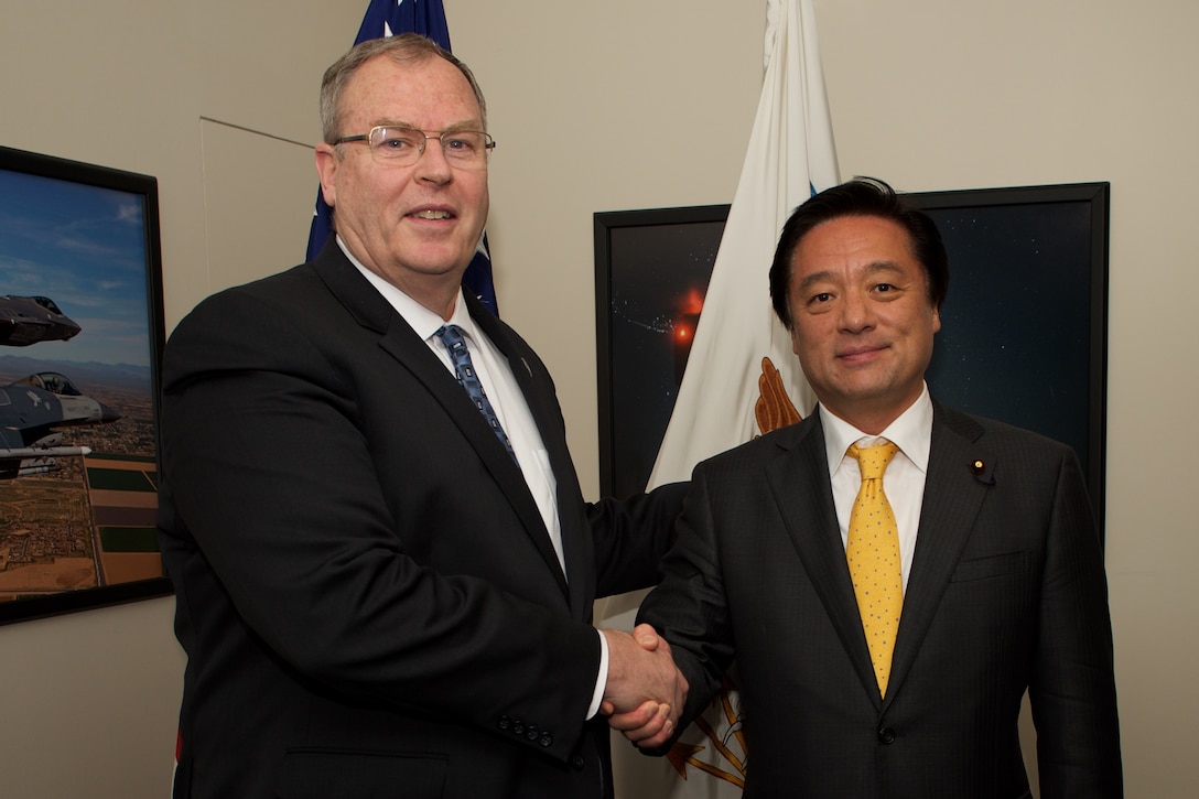 U.S. Deputy Defense Secretary Bob Work and Japanese State Minister of Defense Kenji Wakamiya pose for a photo before a meeting at the Pentagon, Dec. 1, 2015. DoD photo by Casper Manlangit