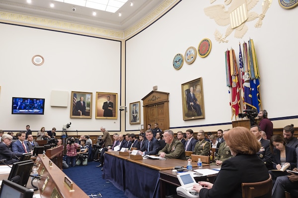 Marine Corps Gen. Joseph F. Dunford, Jr., chairman of the Joint Chiefs of Staff, testifies alongside Secretary of Defense Ash Carter, during a House Armed Services Committee hearing on Capitol Hill, Dec. 1, 2015.
