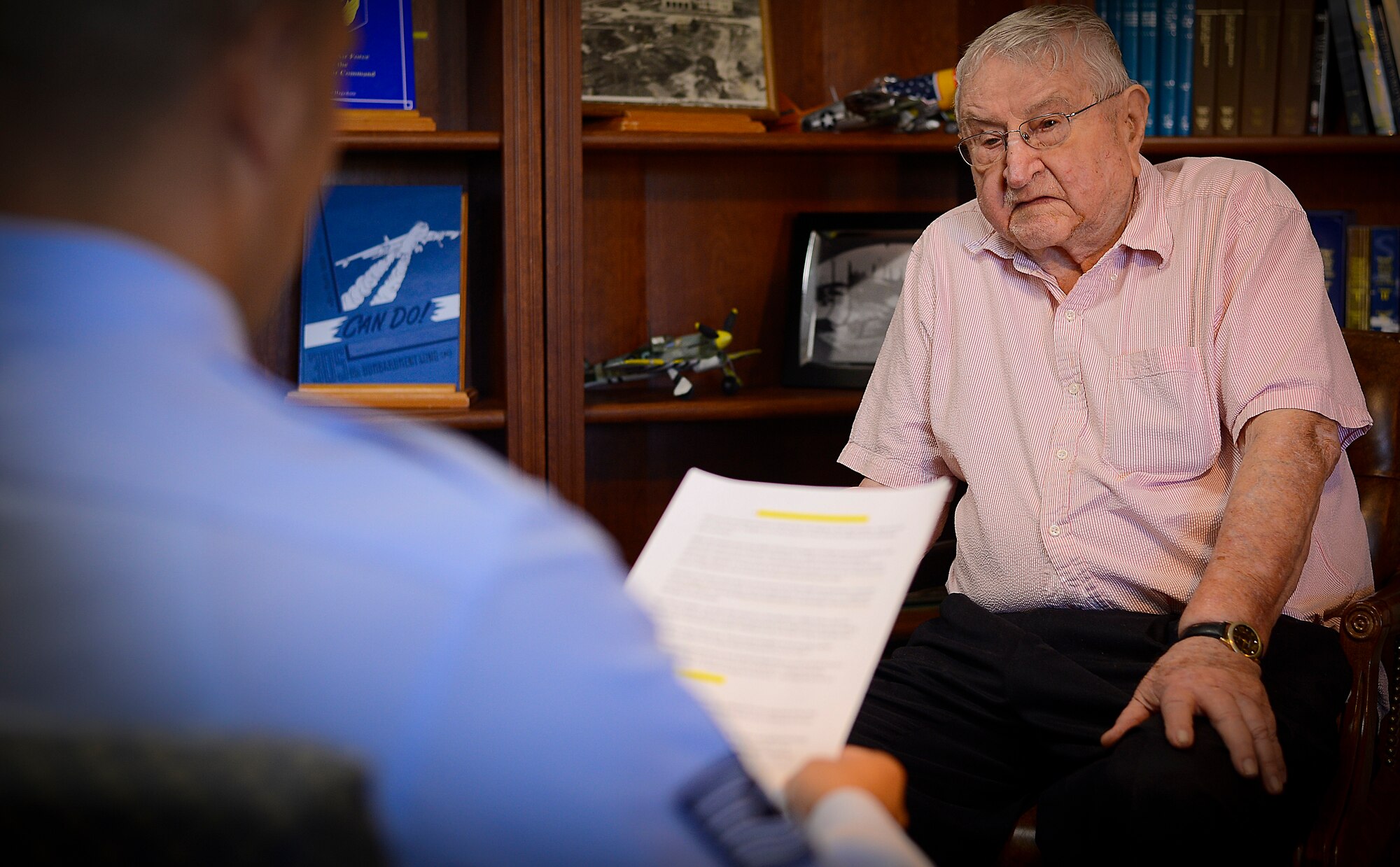 Technical Sgt. Brandon Shapiro interviews retired Col. Harry Buzzett, a WWII, Korean War and Vietnam War veteran, Nov. 30, 2015 at MacDill Air Force Base, Fla. Buzzett is a WestPoint graduate who fought the Germans, Chinese, and Vietcong on the front lines of battle. (U.S. Air Force photo by Airman 1st Class Brad Tipton)  