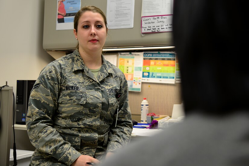 U.S. Air Force Airman 1st Class Chelsea Walker, an aerospace medical service technician assigned to the 633rd Medical Group, listens to a patient during a Women’s Health Clinic appointment at Langley Air Force Base, Va., Nov. 23, 2015. Once a female Service member, spouse or daughter is referred to the Women’s Health Clinic they may receive a variety of services including prenatal and gynecological healthcare and nutrition tips. (U.S. Air Force photo by Senior Airman Aubrey White)