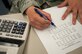 U.S. Air Force Senior Airman Matthew Damore, 7th Comptroller Squadron financial analyst, reviews a chart to see how much money was spent at different squadrons across the wing Nov. 24, 2015, at Dyess Air Force Base, Texas. During the annual fiscal year closeout 7th CPTS Budget Airmen and civilians work long hours to obligate the rest of the budget before the end of the fiscal year. (U.S. Air Force photo by Airman 1st Class Austin Mayfield/Released)