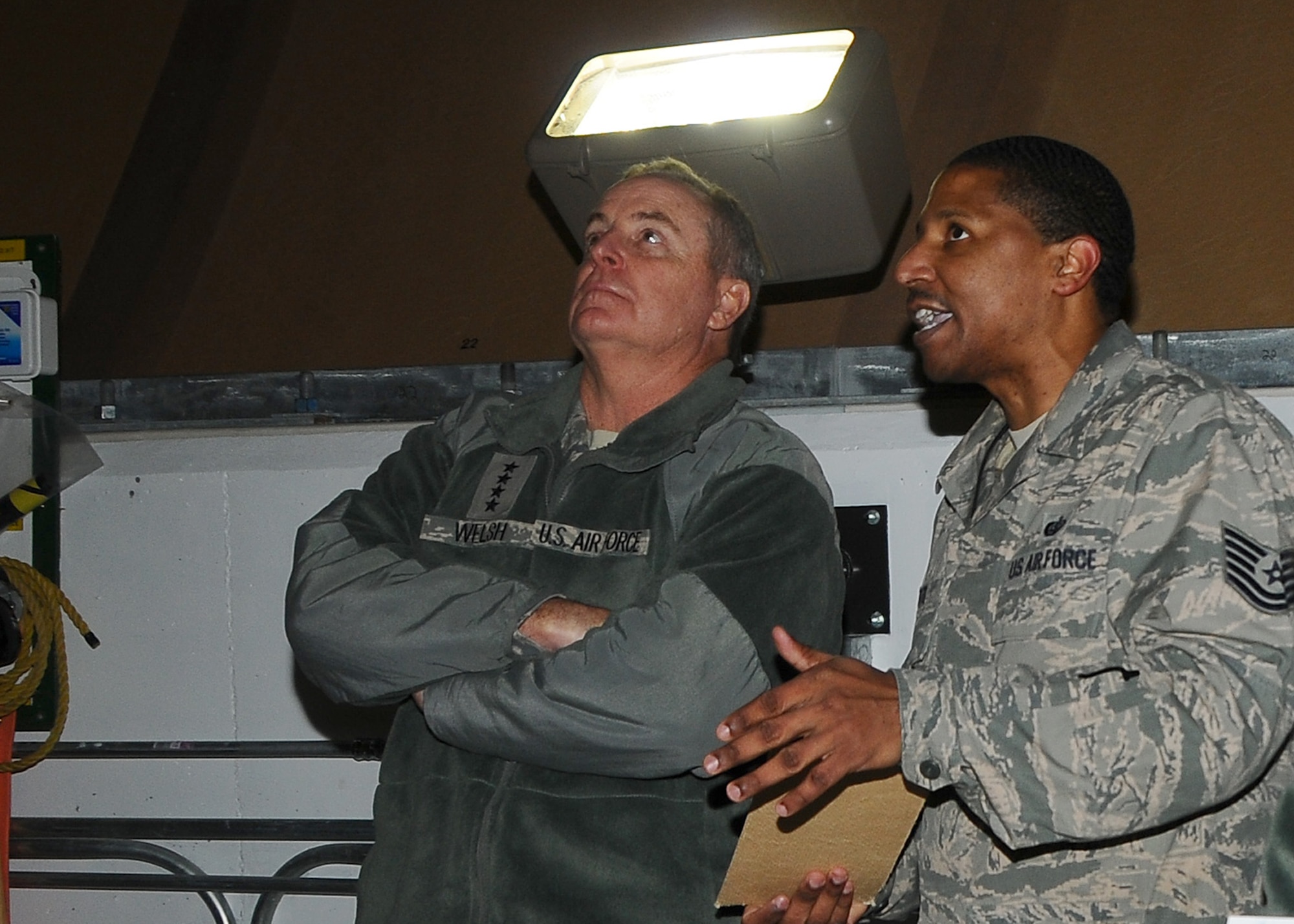 THULE AIR BASE, Greenland - Air Force Chief of Staff Gen. Mark A. Welsh III, is briefed on the mission of the northernmost tracking station in the Air Force Satellite Control Network by Tech. Sgt. Steven Tate, Detachment 1, 23rd Space Operations Squadron, at Thule Air Base, Greenland on Nov. 23. In addition to gaining a better understanding of the unique space and satellite command and control operations located 700 miles north of the Arctic Circle, Welsh was able to wish everyone stationed at Thule AB a happy Thanksgiving. The mission of the 50th Space Wing unit is to provide telemetry, tracking and commanding operations to the U.S. and allied government satellite programs. (U.S. Air Force photo by Staff Sgt. Ebony J. Robertson)    
