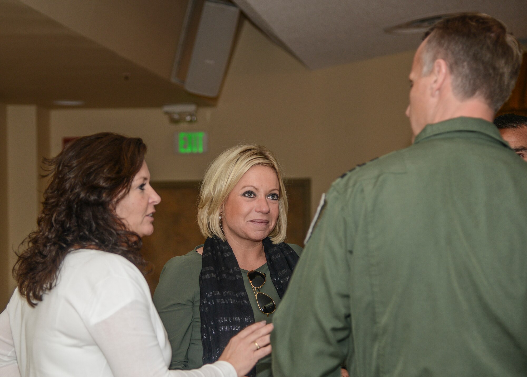 Jeanine Hennis-Plasschaert (center), Netherlands Minister of Defence, visits with fellow countrymen before lunch at Club Muroc Nov. 24. Hennis-Plasschaert visited the Royal Netherlands Air Force's F-35 contingent here at Edwards Air Force Base. (U.S. Air Force photo by Rebecca Amber)