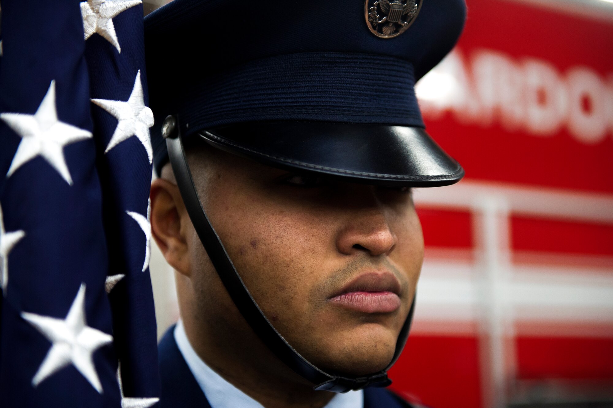 Staff Sgt. Trevor Alexis, 374th Civil Engineer Squadron fire protection NCO in charge of training, serving in the honor guard, marches during a blessing of the fleet ceremony at Yokota Air Base, Japan, Nov. 25, 2015. The ceremony for Fire Engine 14, the newest addition to the Yokota firefighting fleet, included blessings from both Shinto priests and a chaplain. (U.S. Air Force photo by Airman 1st Class Delano Scott/Released) 
