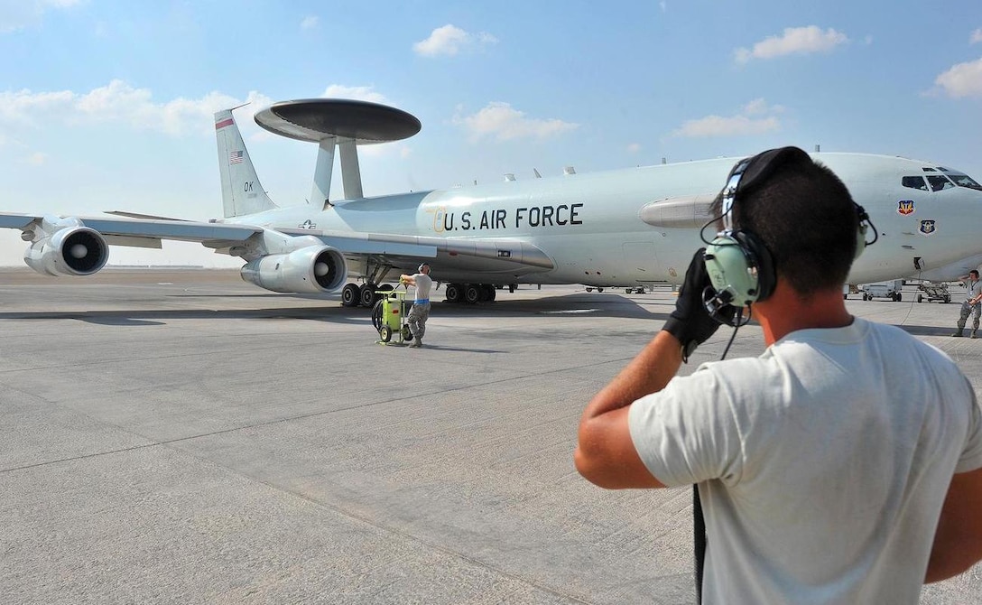 Maintainers from the 380th Air Expeditionary Squadron prep the E-3G Sentry airborne warning and control system aircraft for its first-ever combat sortie from an undisclosed location Southwest Asia, Nov. 20, 2015. The E-3G is the newest model of Sentry aircraft to be recently completed as part of the AWACS modernization program. (U.S. Air Force photo by Staff Sgt. Kentavist P. Brackin)