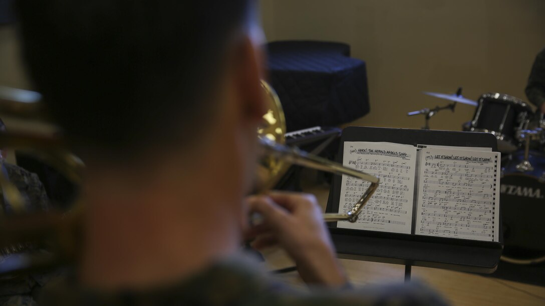 Staff Sgt. Alexander Panos, a trombone player with the 1st Marine Division Band, rehearses alongside his fellow Marines aboard Marine Corps Base Camp Pendleton, Nov. 23, 2015. Panos was recognized as the Marine Corps Musician of the Year Award for 2015.