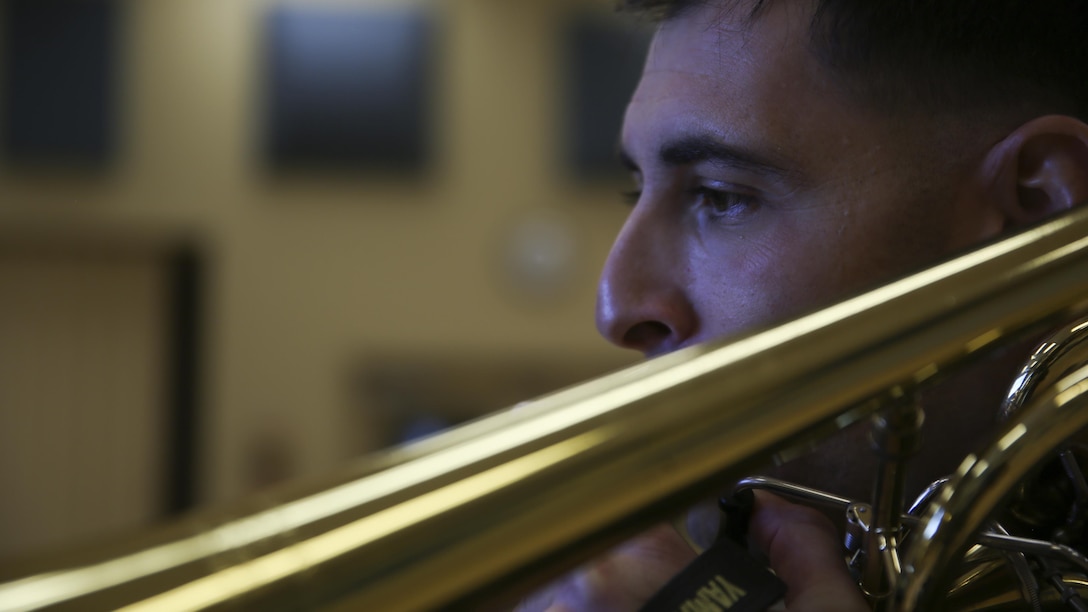 Staff Sgt. Alexander Panos, a trombone player with the 1st Marine Division Band, rehearses alongside his fellow Marines aboard Marine Corps Base Camp Pendleton, Nov. 23, 2015. Panos was recognized as the Marine Corps Musician of the Year Award for 2015. 