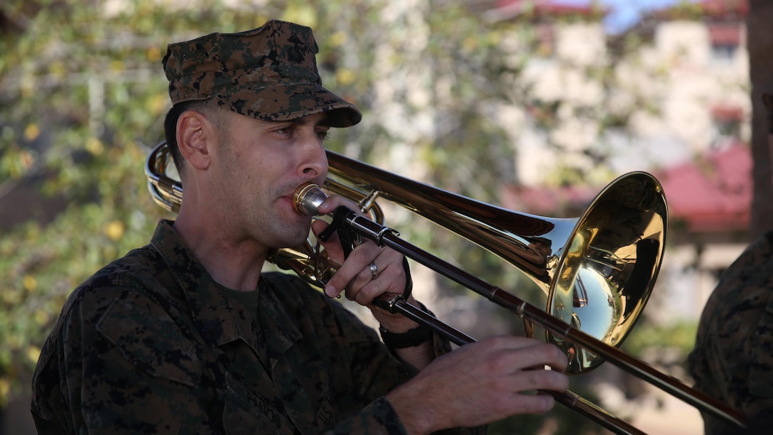 Staff Sgt. Alexander Panos, a trombone player with the 1st Marine Division Band, rehearses alongside his fellow Marines aboard Marine Corps Base Camp Pendleton, Nov. 23, 2015. Panos was recognized as the Marine Corps Musician of the Year Award for 2015.