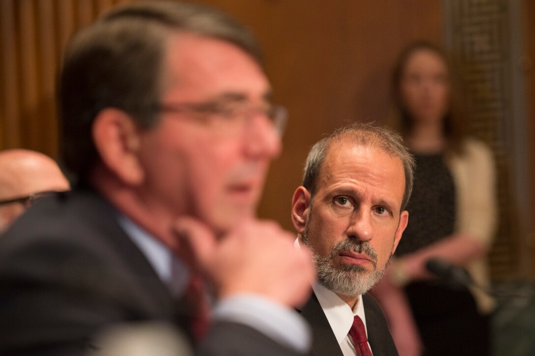 Defense Department Comptroller and Chief Financial Officer Mike McCord listens as Defense Secretary Ash Carter testifies before the Senate Appropriations Defense Subcommittee in Washington, May 6, 2015. McCord said recently that the increase provided by the Bipartisan Budget Act of 2015 gave DoD 98 percent of what it asked for in fiscal year 2016. DoD photo by U.S. Navy Petty Officer 1st Class Daniel Hinton