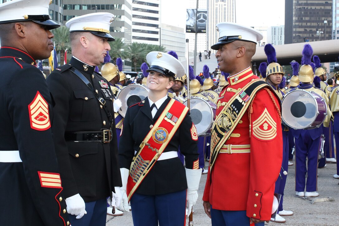 Marines with Marine Corps Band New Orleans meet Master Gunnery Sergeant Kevin Buckles, Marine Corps Drum and Bugle Corps’ Senior Enlisted Advisor and Drum Major of “The Commandant’s Own,” before the Bayou Classic Thanksgiving Parade in New Orleans on Nov. 26, 2015. (U.S. Marine Corps photo by Sgt. Rubin J. Tan/Released)
