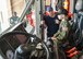 Beau Albert, a firefighter with the 910th Civil Engineer Squadron fire department, shows 12-year-old Ethan Hoffman the inside of a crash rescue vehicle while firefighter Ron Graham watches here, June 24. Ethan was sworn in as an honorary second lieutenant as he became the 910th Airlift Wing’s 62nd Pilot for a Day, receiving a day military experiences and mementos. Ethan was selected for the program by Akron Children’s Hospital in Boardman where he is treated for Bartter Syndrome, a rare kidney disease he has had since birth. (U.S. Air Force photo/Eric M. White)