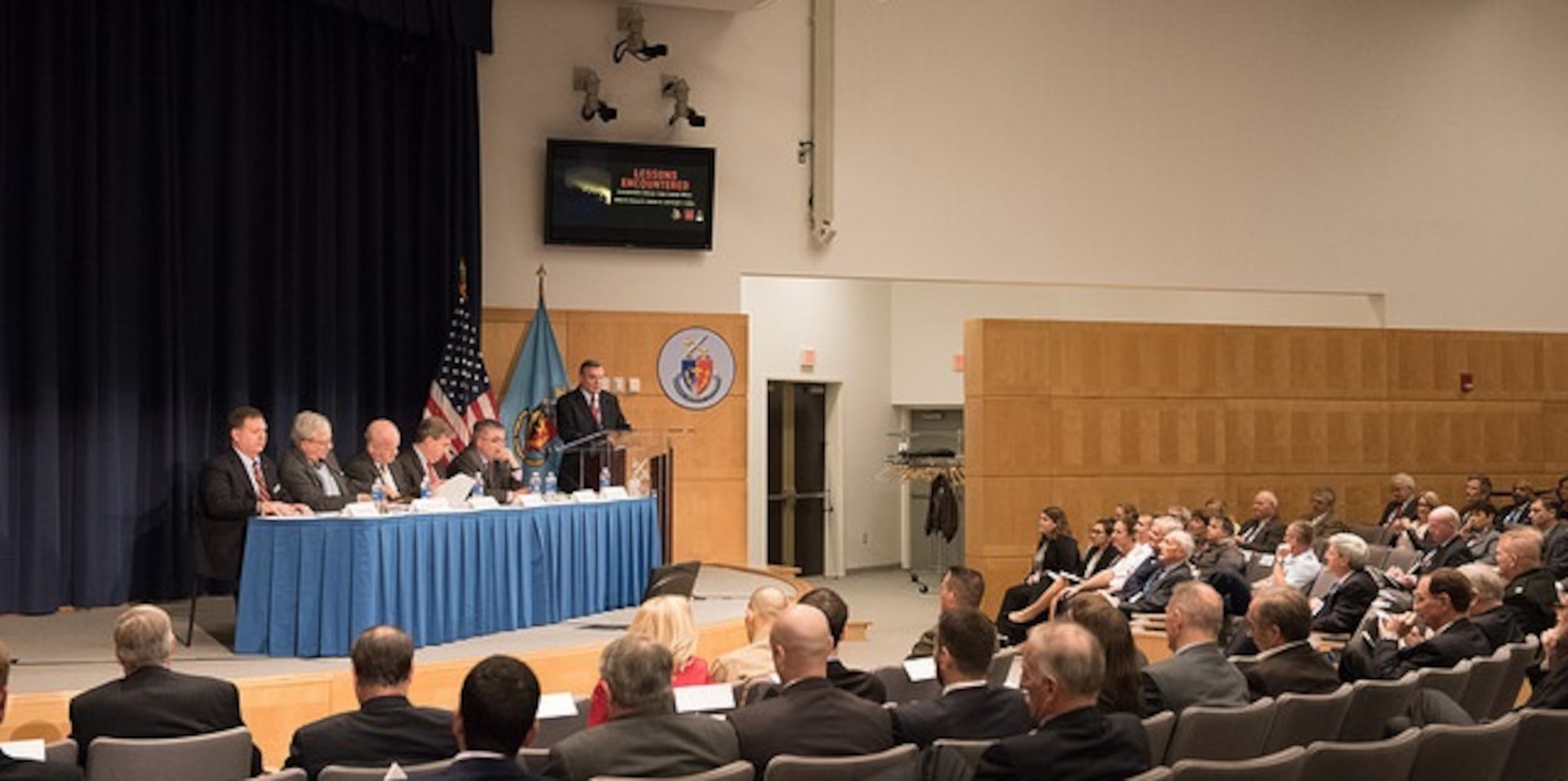 Dr. Joseph Collins, Director, INSS Center for Complex Operations, introduces the panel of Lessons Learned authors.