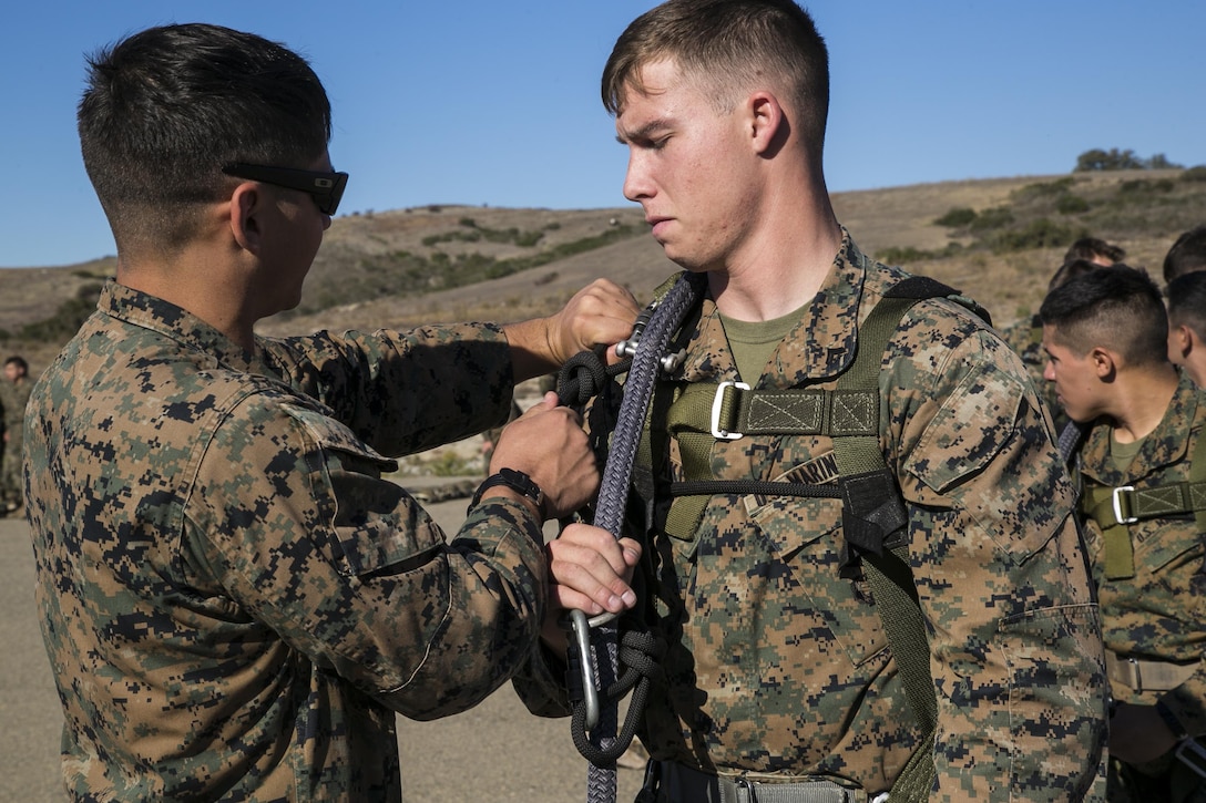 Marines ensure knots are tied properly during Special Patrol Insertion and Extraction rigging training on Camp Pendleton, Calif., Nov. 19, 2015. U.S. Marine Corps photo by Cpl. Briauna Birl