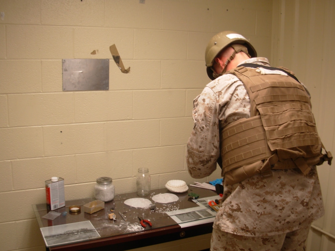 Conducting Site Expoitation of HME lab. 