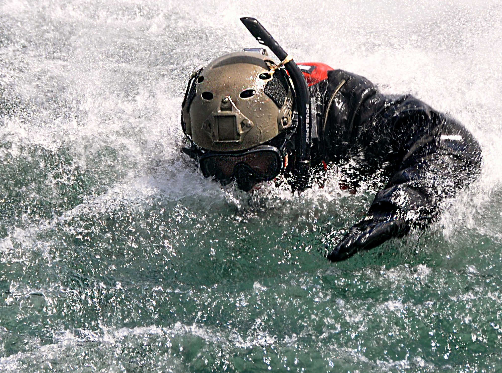 A pararescueman from the 304th Rescue Squadron, Portland Air National Guard Base, Ore., swims in the Pacific Ocean near Oregon’s northwestern coast during an exercise May 5, 2015. Pararescuemen from the 304th practiced various water rescue scenarios with HH-60 helicopter crews from the 305th Rescue Squadron, Davis Monthan Air Force Base, Ariz. Both squadrons are geographically separated units of the 920th Rescue Wing, a combat search-and-rescue Air Force Reserve wing located at Patrick AFB, Fla. (U.S. Air Force photo by 2nd Lt. Anna-Marie Wyant)