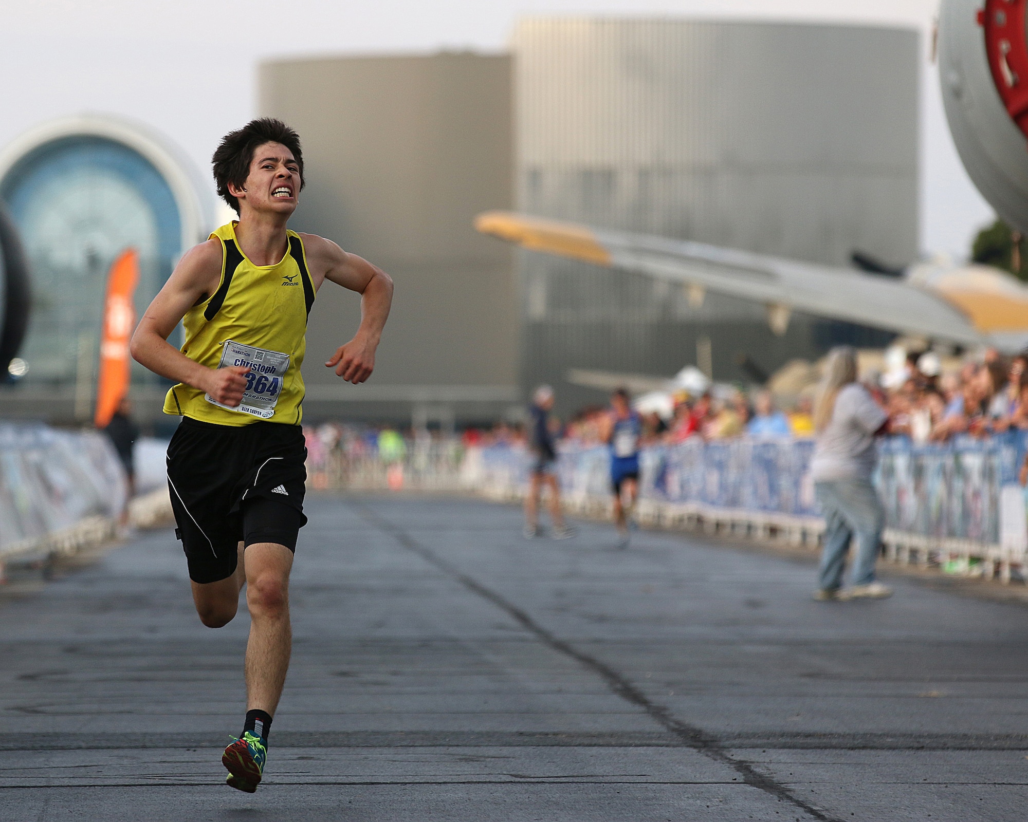 WRIGHT-PATTERSON AIR FORCE BASE, Ohio – Christoph Cikraji, from Durango, Co., races across the finish line in the 19th Annual Air Force Marathon held Sept. 19, 2015. Cikraji won third place in the AF Marathon 10K for the male division with a runtime of 37:35. The Air Force Marathon is an annual endurance event held the third Saturday of September at Wright-Patterson Air Force Base in Dayton, Ohio. (U.S. Air Force photo /Tech. Sgt. Patrick O’Reilly)
