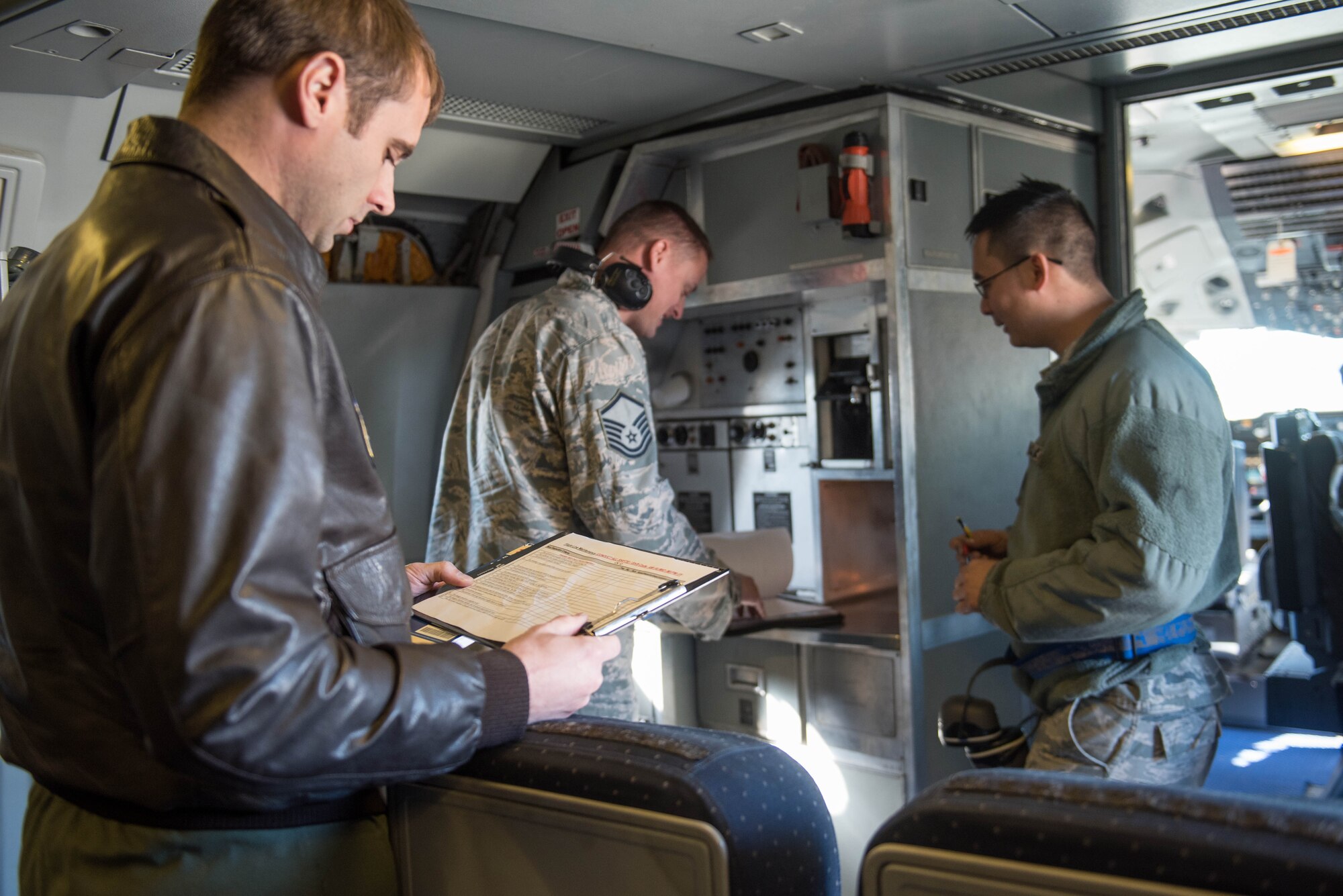 151125-F-LL959-029.jpg
Capt. Joshua Jowiski, 305th Air Mobility Wing safety officer, and, Master Sgt. Kevin Duffy, 305th Air Mobility Wing flight safety officer, inspect  KC-10 documents before flight as Tech. Sgt. Jason Kam , 714  Aircraft Maintenance Squadron, electro environment technician, looks on Nov. 25, 2015, at Joint Base McGuire-Dix-Lakehurst, N.J.  The 305th AMW Flight Safety Program ensures aircrews  consider the safety implications of their actions and those of their colleagues.   (U.S. Air Force photo by Russ Meseroll/Released)
