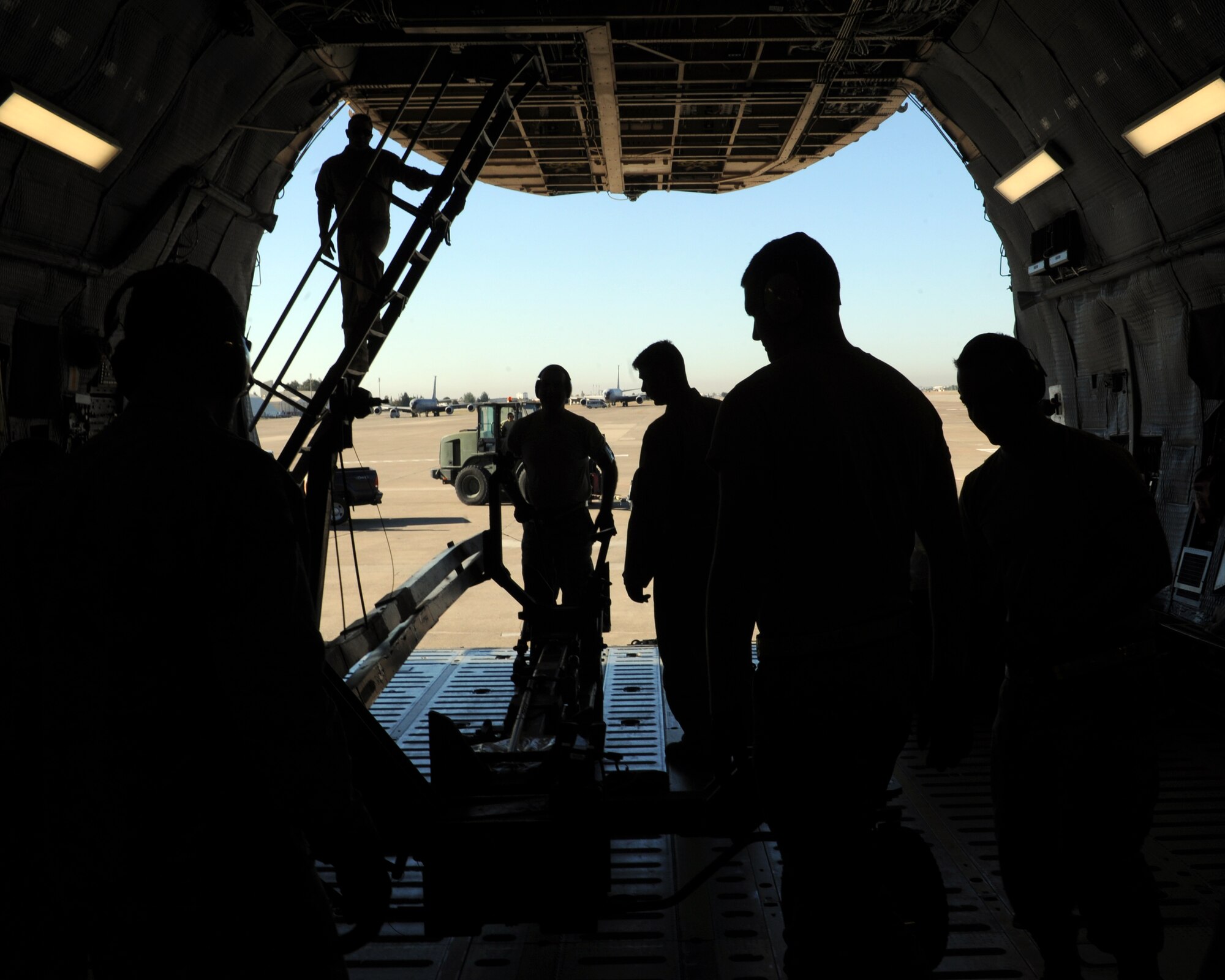 Airmen from the 728th Air Mobility Squadron unload a C-5M Super Galaxy Nov. 13, 2015, at Incirlik Air Base, Turkey. The C-5 is one of the many aircraft being utilized by the U.S. Air Force to deliver personnel and cargo to Incirlik AB in support of Operation Inherent Resolve. (U.S Air Force photo by Airman 1st Class Daniel Lile/Released)