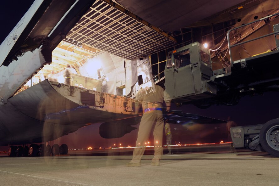 Airmen from the 728th Air Mobility Squadron unload a C-5M Super Galaxy Nov. 12, 2015, at Incirlik Air Base, Turkey. The 728th AMS has supported the delivery of more than one million tons of sustainment cargo in support of operations flowing through Incirlik AB including Operation Inherent Resolve. (U.S. Air Force photo by Airman 1st Class Daniel Lile/Released)