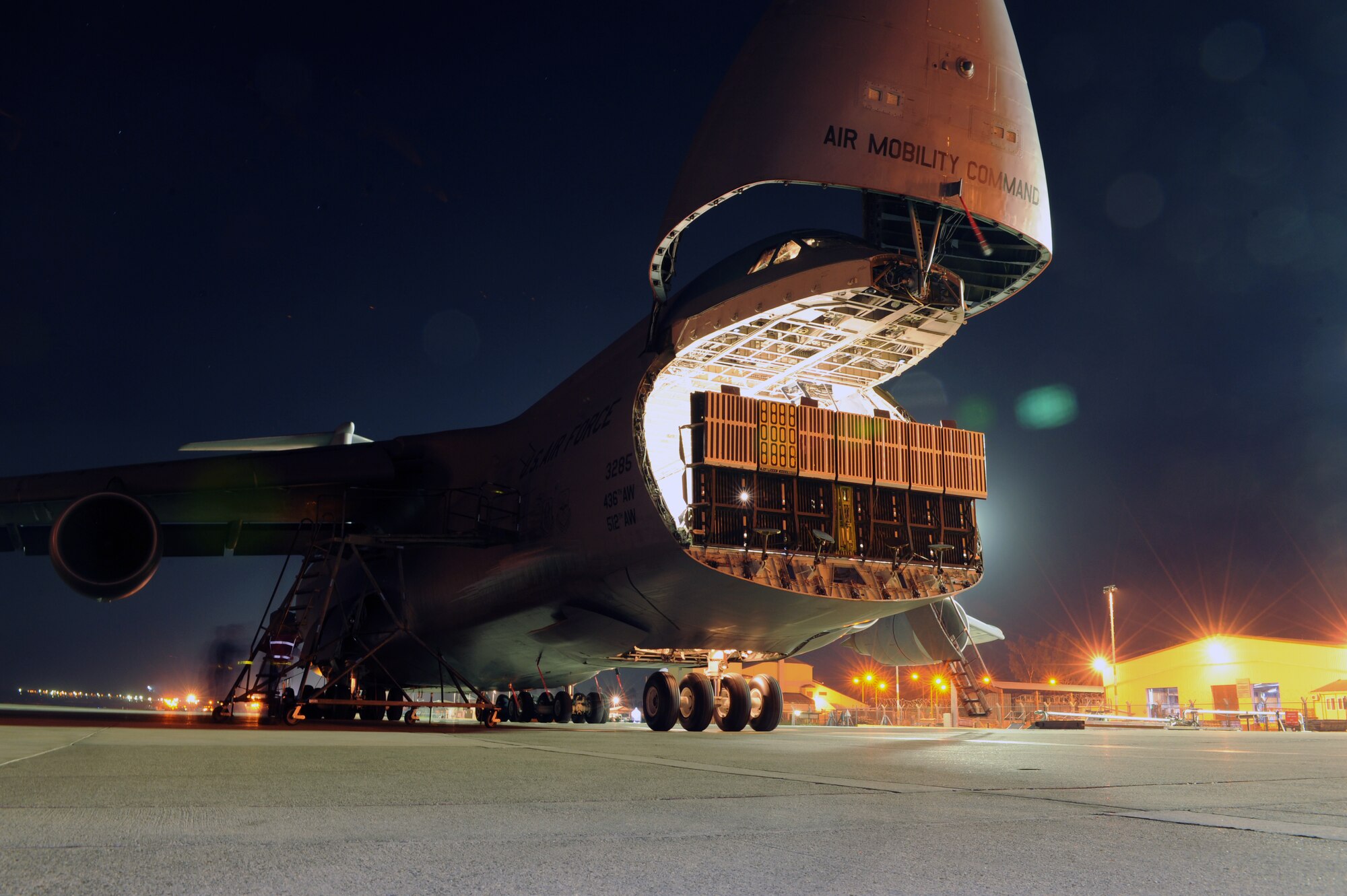 The 728th Air Mobility Squadron prepares to download a C-5M Super Galaxy Nov. 12, 2015, at Incirlik Air Base, Turkey. The C-5 is one of the many aircraft being utilized by the U.S. Air Force to deliver personnel and cargo to Incirlik AB in support of Operation Inherent Resolve. (U.S Air Force photo by Airman 1st Class Daniel Lile/Released)