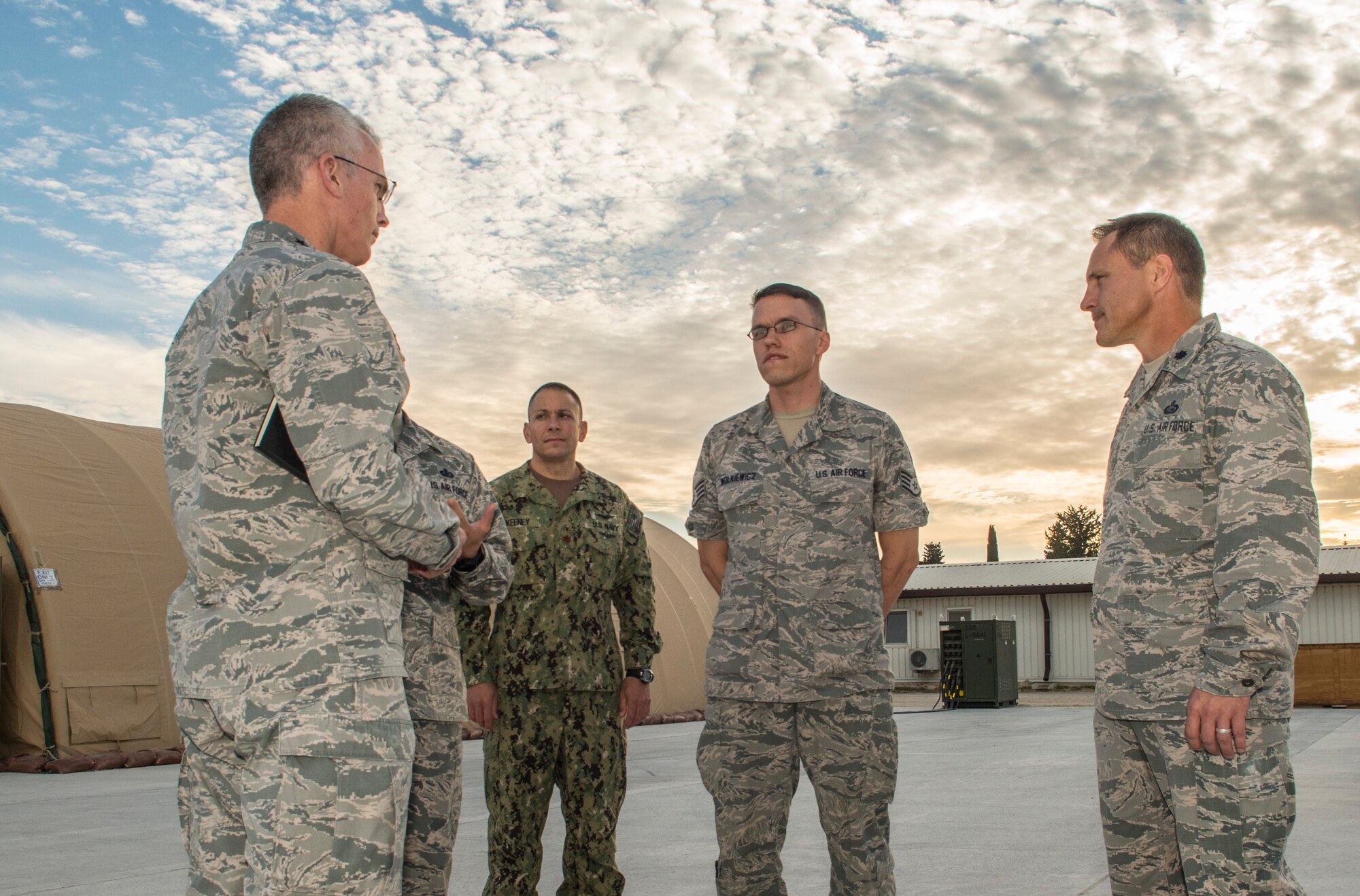 Vice Chairman of the Joint Chiefs of Staff, Gen. Paul J. Selva, speaks with Lt Col. Tom Giles, 39th Force Support Squadron commander (right), and Staff Sgt. Joseph Wolkiewicz, 39th Force Support Squadron facility manager (center), during a base tour Nov. 25, 2015, at Incirlik Air Base, Turkey. The general visited the base to get a firsthand look at operations in support of Operation Inherent Resolve and thank Airmen for their hard work. (U.S. Air Force photo by Staff Sgt. Eboni Reams/Released)
