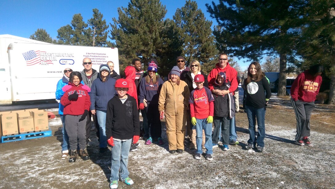 Members of the 140th Wing, Colorado Air National Guard, took time on their day off to help those in need for Thanksgiving. The team of volunteers helps assemble food boxes for fellow Airmen who needed a little help this holiday season. (Photo courtesy of Ms. Michelle Abarca)