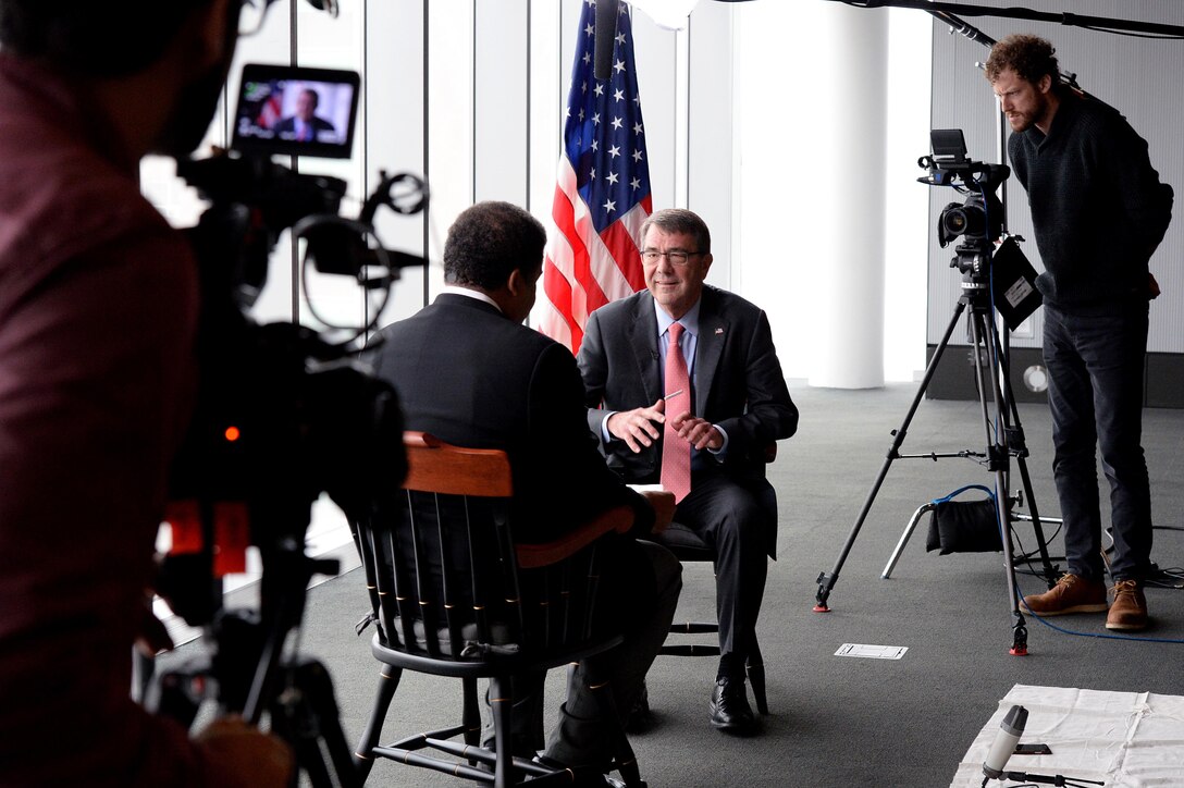 Defense Secretary Ash Carter sits down to an interview with Neil deGrasse Tyson, an astrophysicist, author and science communicator, in Boston, Mass., Dec. 2, 2015. DoD photo by Army Sgt. 1st Class Clydell Kinchen