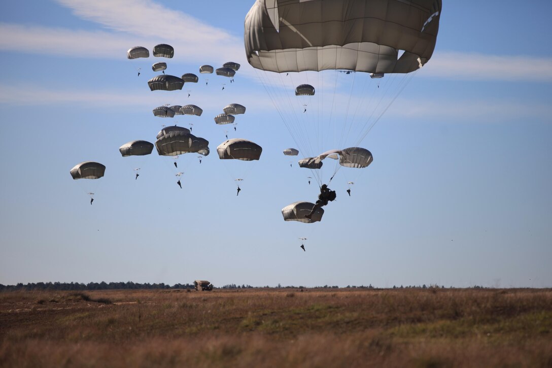 Paratroopers descend during training over the Sicily Drop Zone on Fort Bragg, N.C., Nov. 21, 2015. U.S. Army photo by Spc. Darius D. Davis