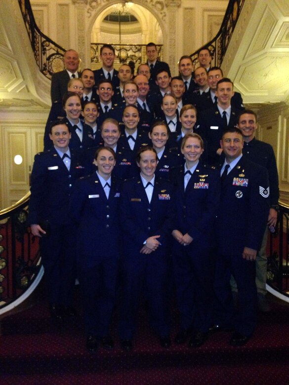 Airmen from the men's and women's indoor soccer team take a photo together during a banquet as part of the Royal Air Force's AIRCOM Indoor Football Championship in the United Kingdom, Nov. 13, 2015, Joint Base Pearl Harbor-Hickam, Hawaii. (Courtesy photo)