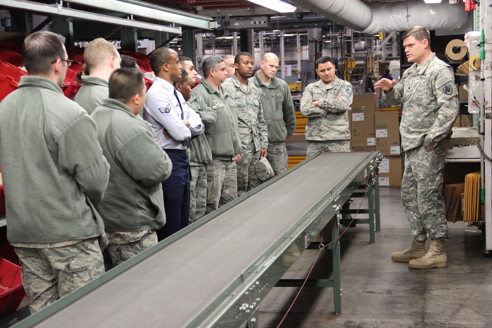 Members of the 87th Logistics Readiness Support Group from MaGuire Air Force Base, N.J., tour the Eastern Distribution Center, the Department of Defense’s largest warehouse, during their Dec. 3 visit to DLA Distribution Headquarters.