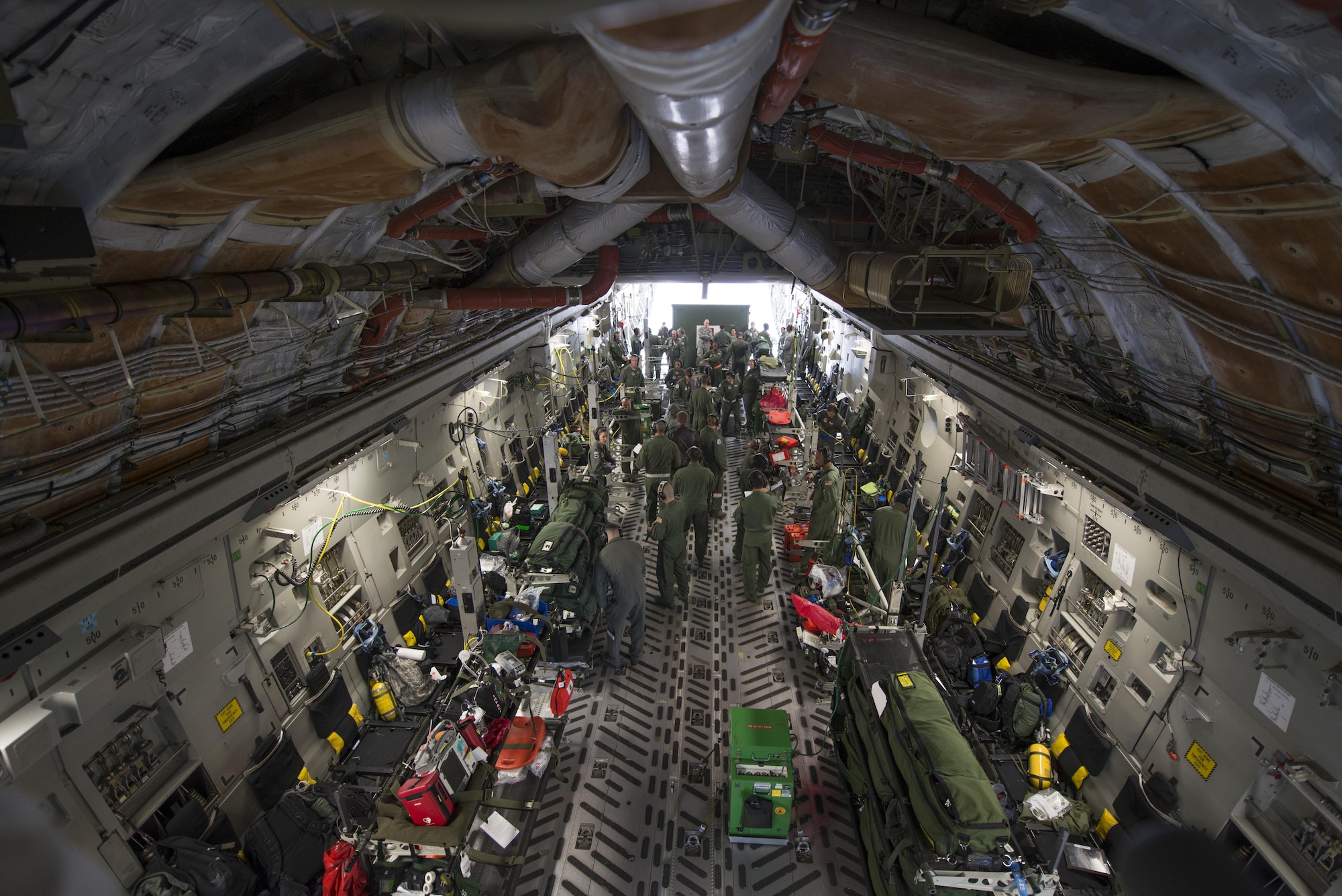 The 375th Aeromedical Evacuation Squadron, from Scott Air Force Base, Ill., teamed up with the 43rd Aeromedical Evacuation Squadron, from Pope Field, North Carolina, for a collaborative Air Mobility Command training initiative. Both teams were flown to Pope Field in a Boeing C-17 Globemaster III by the 6th Airlift Squadron, Joint Base McGuire-Dix-Lakehurst, New Jersey, for a weeklong exercise. (U.S. Air Force photos/Airman 1st Class Melissa Estevez)