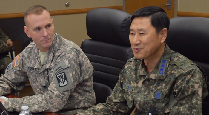 Col. Mark Holler, 35th Air Defense Artillery Brigade commander and Col. Yeong Gu Yu, chief of logistics, Republic of Korea Air Force Air and Missile Defense Command, deliver opening remarks at the 2015 Patriot Technology Exchange, Nov 30. The exchange is an annual event conducted at Osan Air Base to share maintenance trends and topics of interest involving the maintenance of the Patriot missile system.