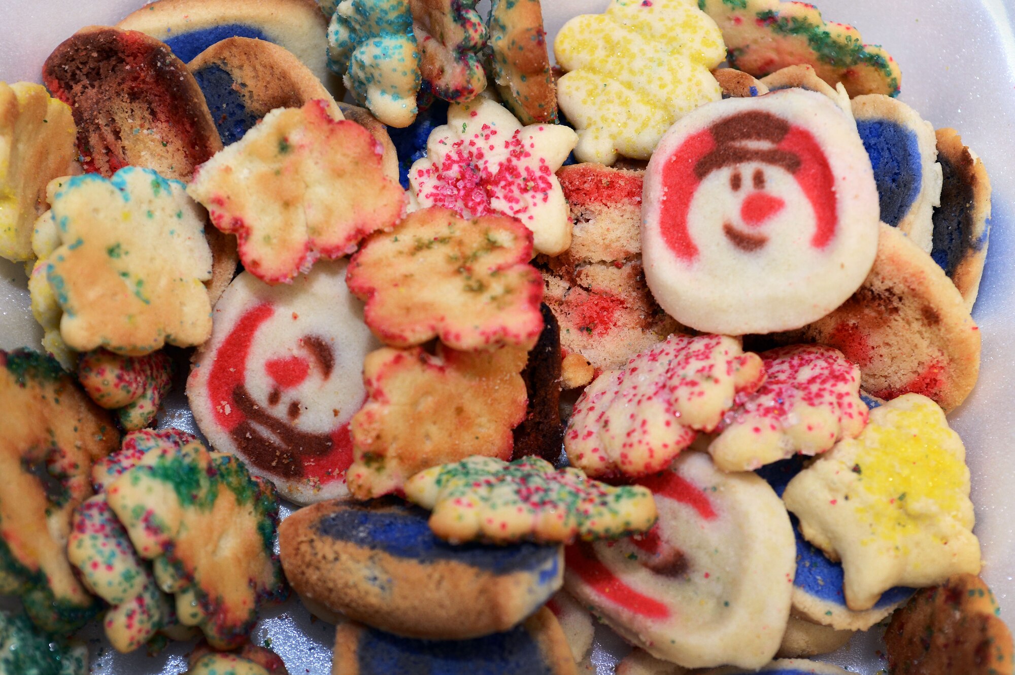 Home-made holiday cookies baked by volunteers sit on a plate at the Team Shaw Officers’ Spouses Club’s annual holiday cookie drive at Shaw Air Force Base, S.C., Dec. 3, 2015. More than 43,000 treats and 5,000 cards were collected by the OSC from schools, churches, small businesses and other organizations in the Shaw community to be distributed to Team Shaw’s deployed personnel and dormitory residents. (U.S. Air Force photo by Senior Airman Zade Vadnais)