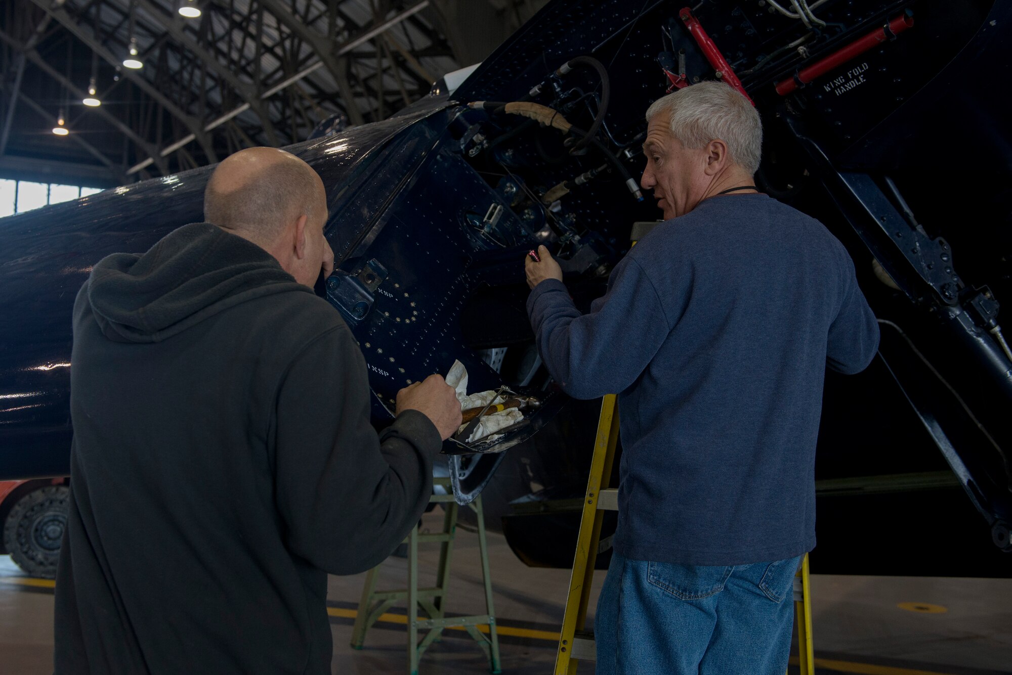 The 375th Operations Support Squadron worked with many base units to assist Brad Deckert Nov. 22, 2015. Deckert is the owner of a 1945 TBM Avenger, Torpedo Bomber, and visited Scott to repair parts of the aircraft. After repairs the Avenger, Deckert was able to complete a test flight and prepared to leave Nov. 24, 2015. (U.S. Air Force photo/ Airman 1st Class Kiana Brothers) 