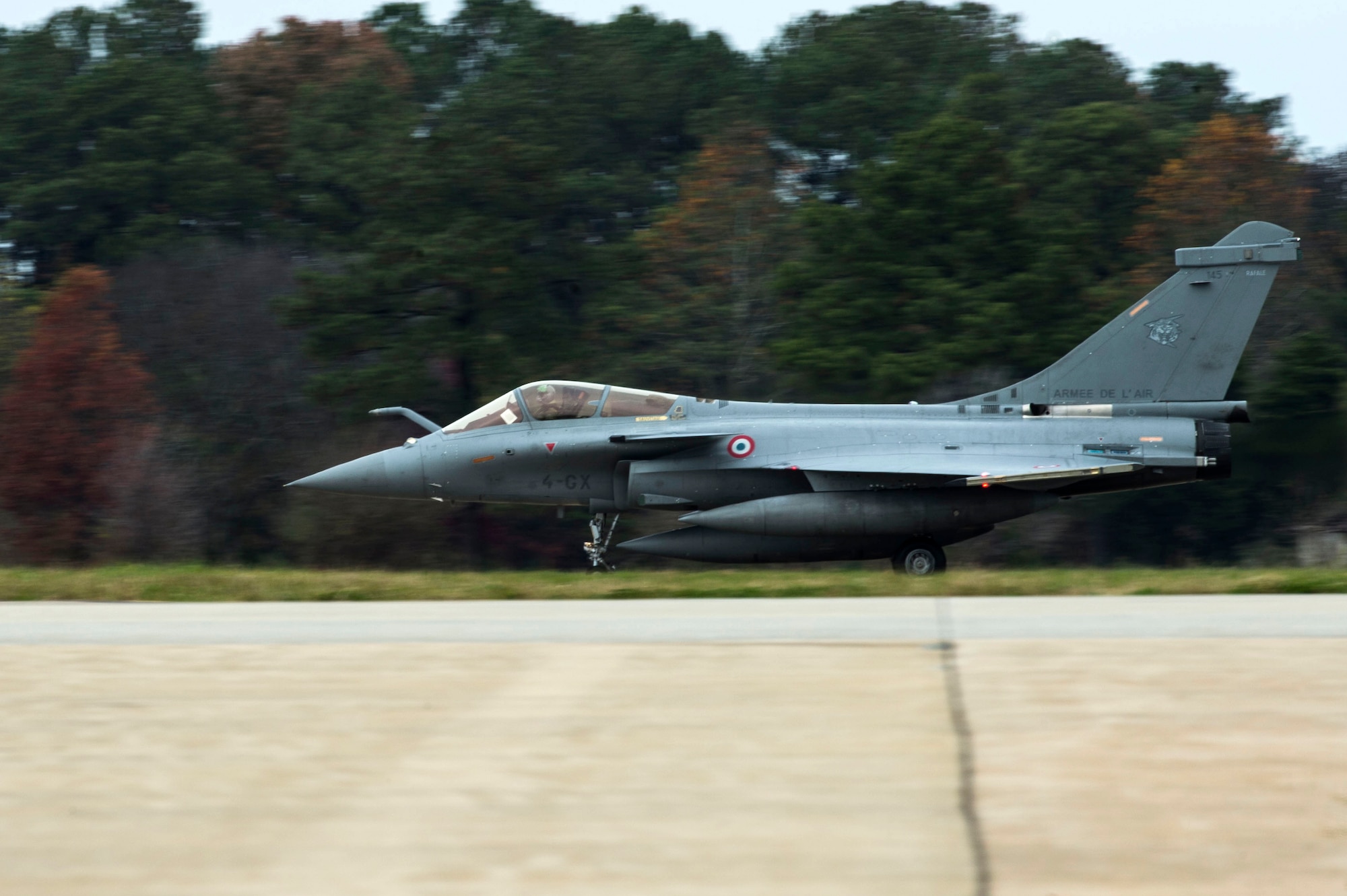 A French Air Force (FrAF) Dassault Rafale lands at Langley Air Force Base, Va., Dec. 1, 2015. U.S. Service members are partnering with members of the British Royal Air Force and the FrAF for the inaugural Trilateral Exercise, which will focus on operations in a highly-contested operational environment through a variety of simulated adversary scenarios. (U.S. Air Force photo by Senior Airman Kayla Newman)