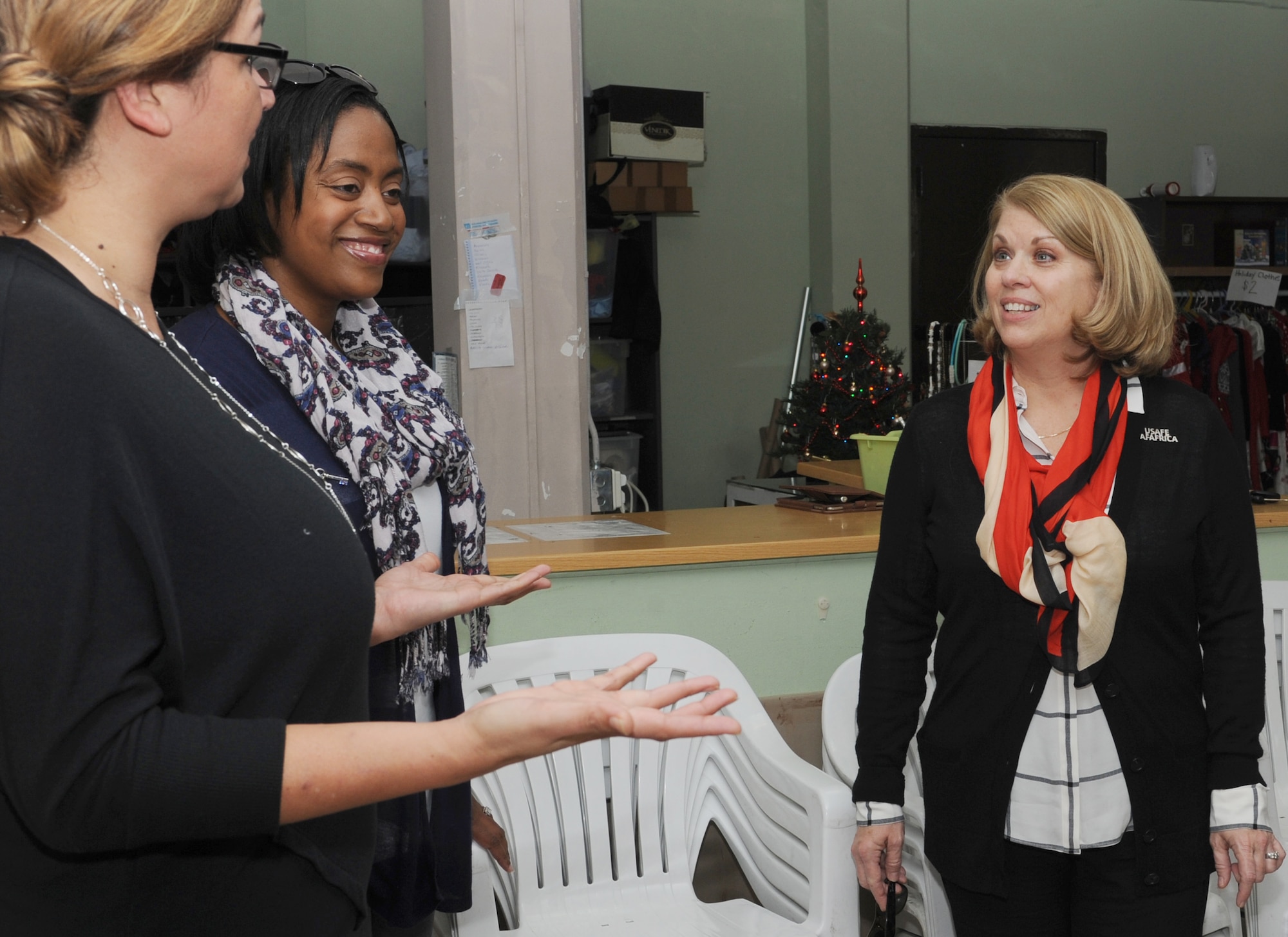 Sharon Gorenc, wife of Gen. Frank Gorenc, U.S. Air Forces in Europe and U.S. Air Forces Africa commander, visits with members of the Incirlik Combined Spouses Club at the base thrift store Dec. 1, 2015, at Incirlik Air Base, Turkey. Gorenc visited the thrift store, commissary, Exchange and other facilities key to the wellbeing of Incirlik Airmen and their families. (U.S. Air Force photo by Airman 1st Class Daniel Lile/Released) 