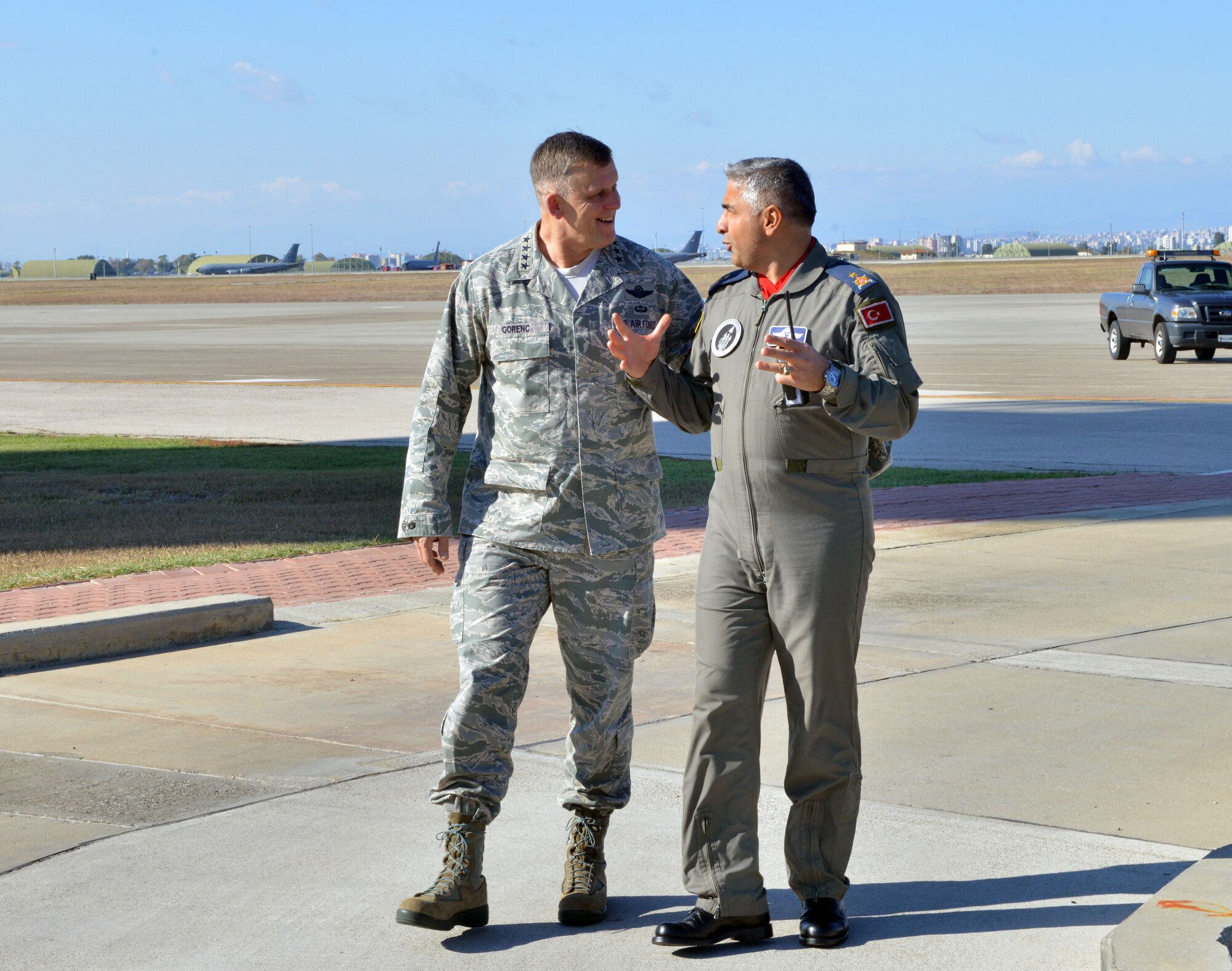 Gen. Frank Gorenc, U.S. Air Forces in Europe and Air Forces Africa commander, speaks with Brig. Gen. Bekir Ercan Van, 10th Tanker Base Command commander, during a base visit Dec. 1, 2015, at Incirlik Air Base, Turkey. Gorenc visited Incirlik AB to visit Airmen deployed to Turkey in support of Operation Inherent Resolve. (U.S. Air Force photo by Staff Sgt. Michael Battles/Released)